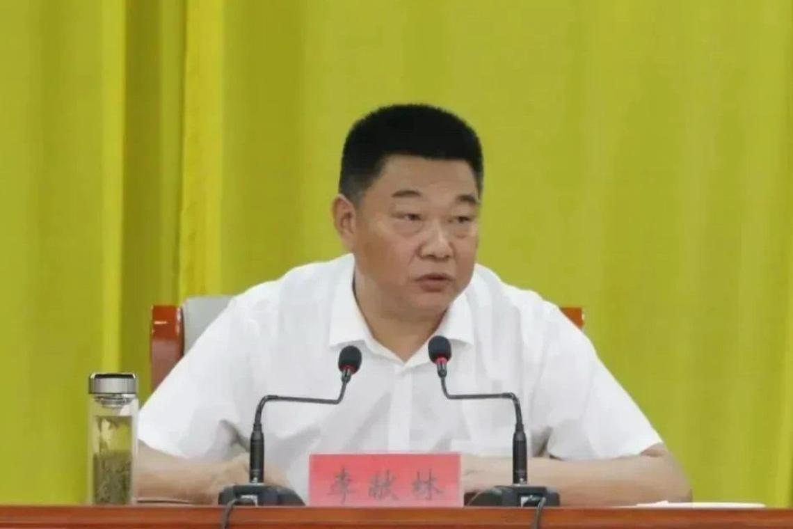 网传罗山县委常委、政法委书记李献林的照片。(互联网)