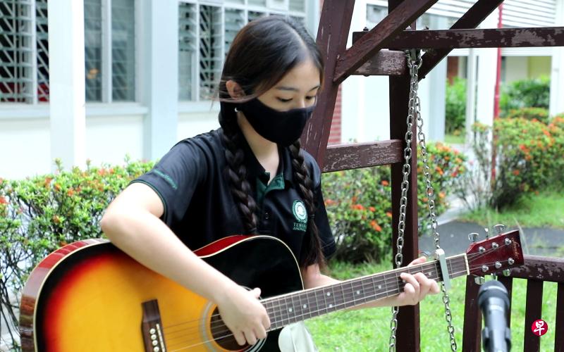 Girl playing guitar