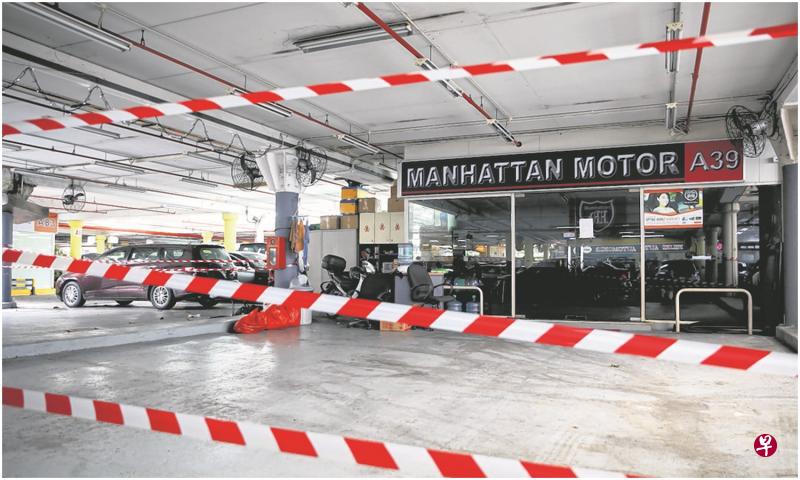 二手车行Manhattan Motor被指过去一年来向顾客收钱后，却没有办理汽车转让手续。（海峡时报）