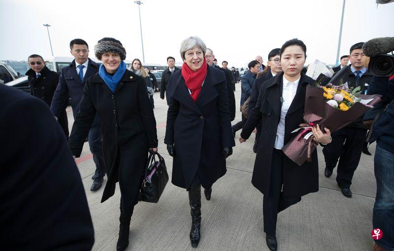 Theresa May in Wuhan on Jan. 31. U.K. Prime Minister Theresa May arrived in China seeking to balance her desire to build a powerful post-Brexit trade relationship with a clutch of political concerns. PHOTO: BLOOMBERG